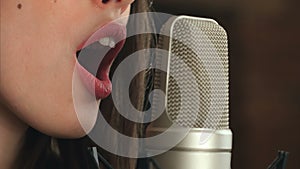 Female singer and microphone