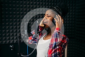 Female singer songs in audio recording studio