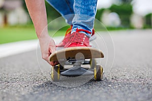 Skateboarder riding skateboard through the street