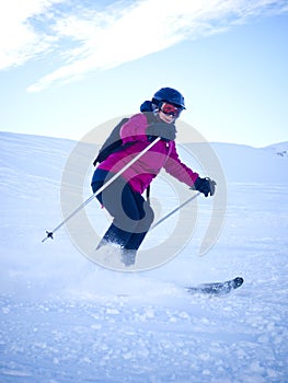 Female skier with helmet photo