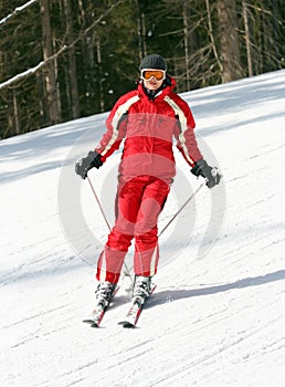 Female skier on a slope