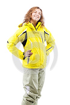 Female skier in yellow jacket