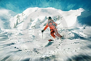 Female skiers dynamic ride in deep snow