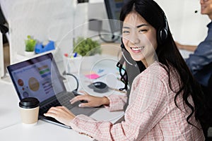 Female smiling wear headset operator worker call center hotline. woman working customer support service operator. communication in