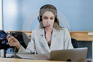 Female smiling wear headset operator worker call center hotline. woman working customer support service operator. communication in