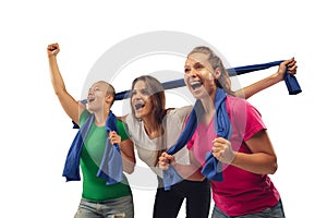 Female soccer fans cheering for favourite sport team with bright emotions isolated on white studio background