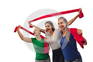 Female soccer fans cheering for favourite sport team with bright emotions isolated on white studio background