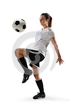 Female Soccer Player Dribbling Ball