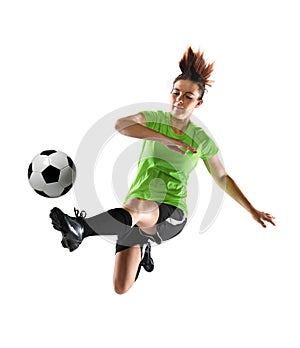 Female Soccer Player Kicking Ball