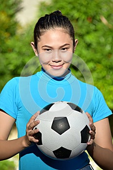 Female Soccer Player Portrait With Soccer Ball