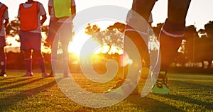 Female soccer players waiting to kick the ball on soccer field. 4k