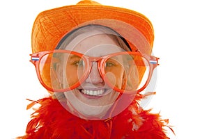 Female soccer supporter with big orange glasses photo