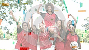 Female soccer team against colourful confetti