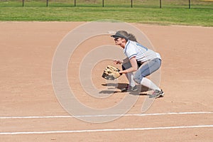 Female softball player in ready position photo