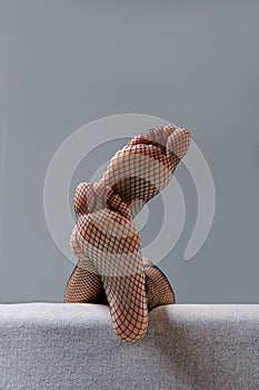 Female soles in fishnet tights