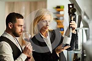 Female Sommelier Recommending Wine