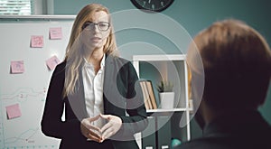 Female speaker giving presentation