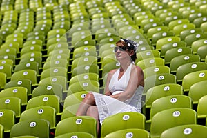 A female spectator in the sun
