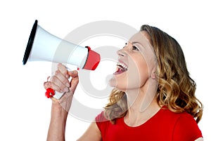 Female spokesperson holding megaphone