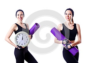 The female sportsman holding rug and clock isolated on white