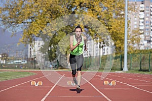 Female Sprinter Getting Ready to Start The Race