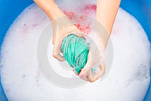 Female squeeze wring out wet fabric cloth