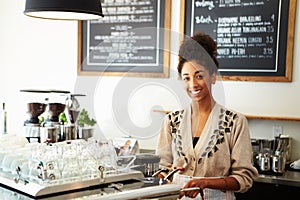 Female Staff In Coffee Shop