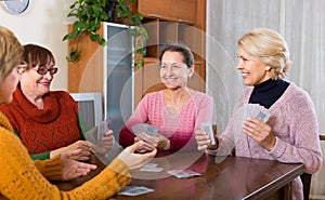 Female staking money during bridge