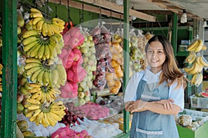 Female Stall Holder At Fresh Fruits Market