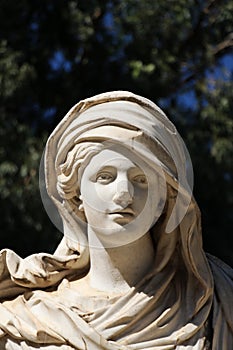 Female statue in a garden