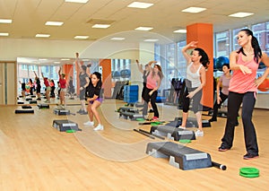 Female on the step board during exercise