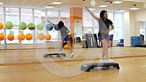 Female on the step board during exercise