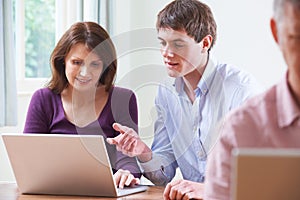 Female Student In Adult Education Computer Class