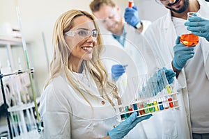 Female student of chemistry working in laboratory