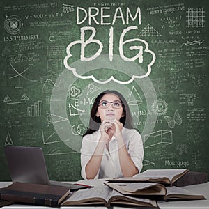 Female student and Dream Big word