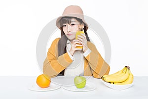 Female student and her fruit and milk