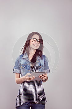 Female student with a laptop in the studio