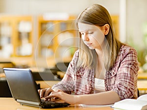 Female student with laptop working