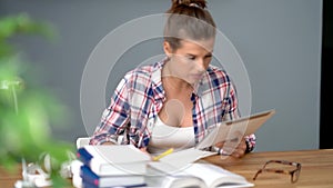 Female student learning at home