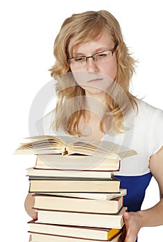 Female student with pile of books