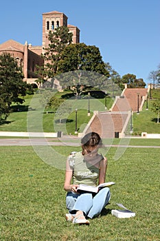 Female student reads for the class