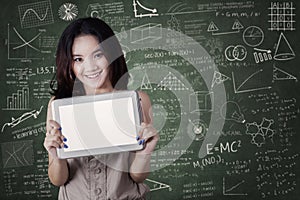 Female student shows blank tablet screen
