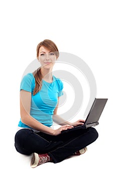 Female student sitting with laptop. Isolated