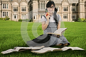 Female student studying outdoors 1