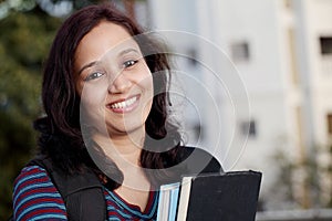 Female student studying outdoors