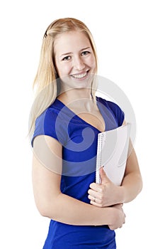 Female student with writting pad smiles happy
