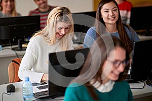 Female students enjoying an informatics lecture