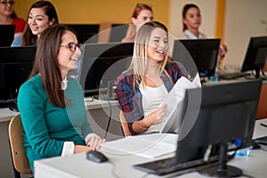 Female students at an informatics lecture photo