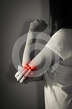 Female suffering from elbow pain