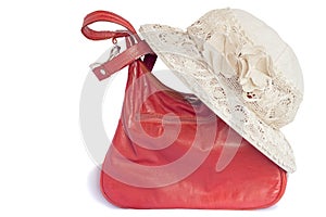 Female summer hat for protection against the sun and a bag on a